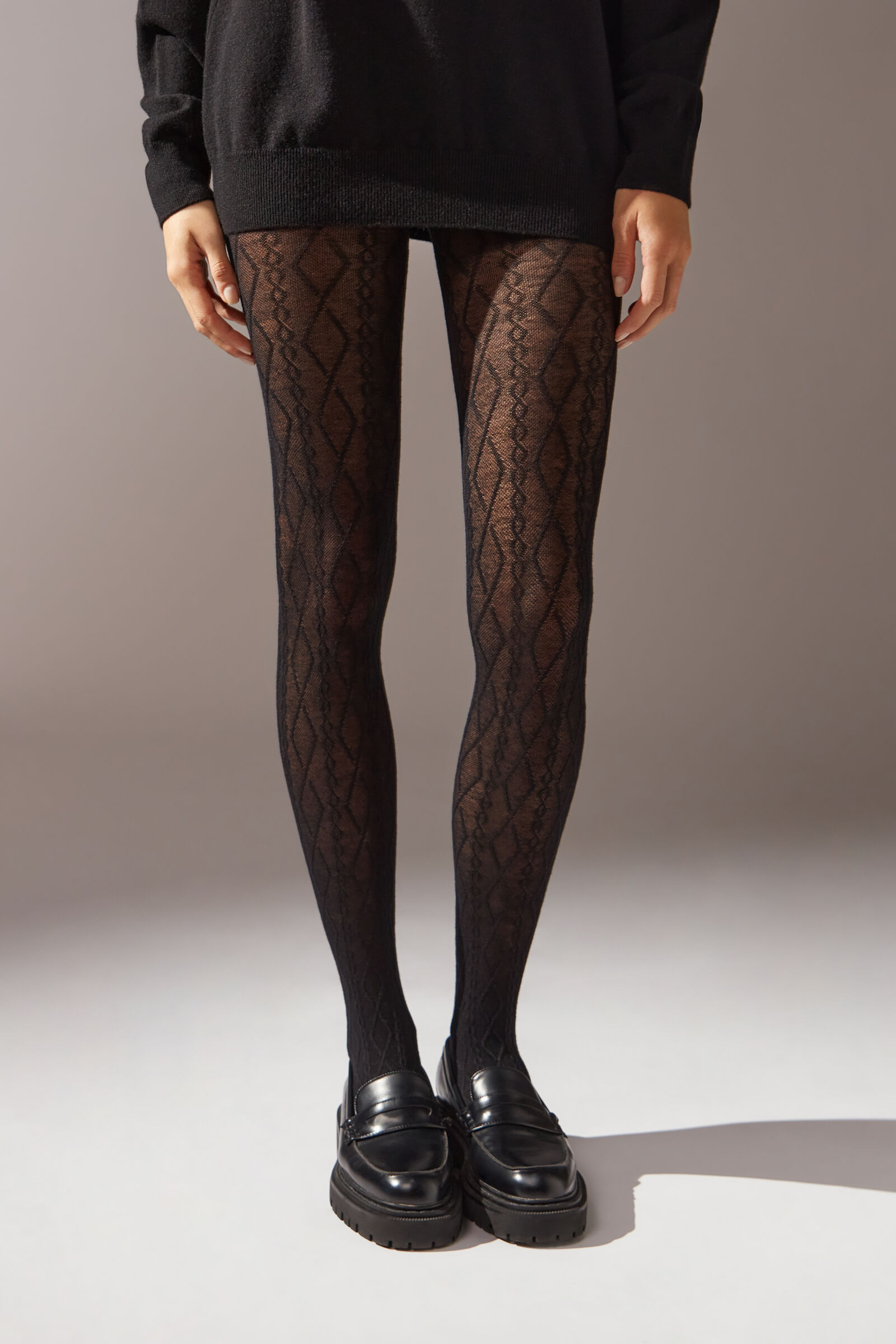 meia-calça com cashmere e padrão entrelaçado - preto
