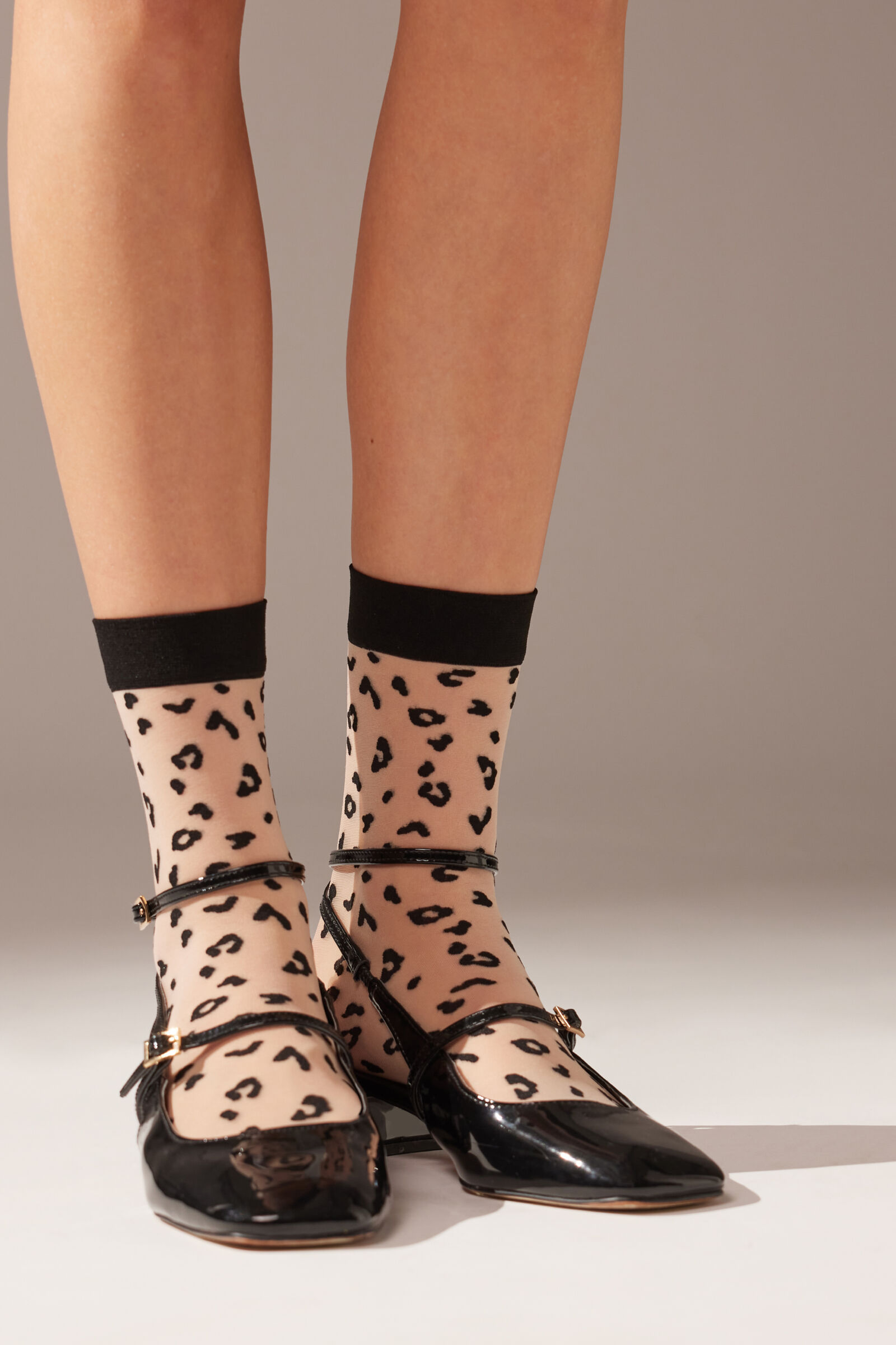 meia curta transparente fio 15 animal print - preto
